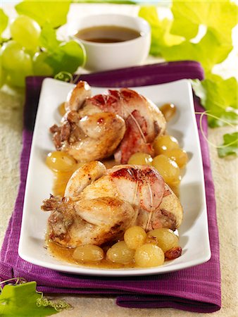 quail dish - Quails cooked in a casserole dish with grapes and cognac Stock Photo - Premium Royalty-Free, Code: 652-03801107