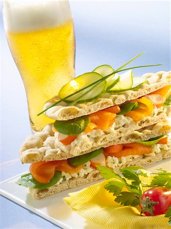 round slice - Norwegian sandwich and a glass of lager Stock Photo - Premium Royalty-Free, Code: 652-03801179