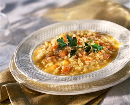 pumpkin risotto - Pumpkin risotto Stock Photo - Premium Royalty-Free, Code: 652-03801194