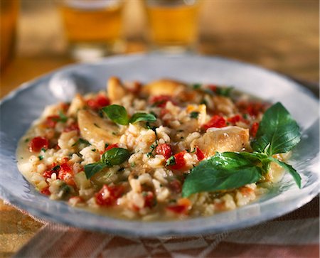 Chicken,tomato and basil risotto Stock Photo - Premium Royalty-Free, Code: 652-03801195