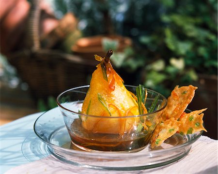 Poached pear with confit fruits and honey Stock Photo - Premium Royalty-Free, Code: 652-03801277