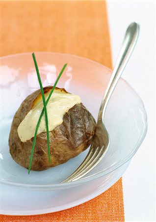 relleno (comida) - Potato in it's jacket with mustard-flavored  fromage blanc Foto de stock - Sin royalties Premium, Código: 652-03801746