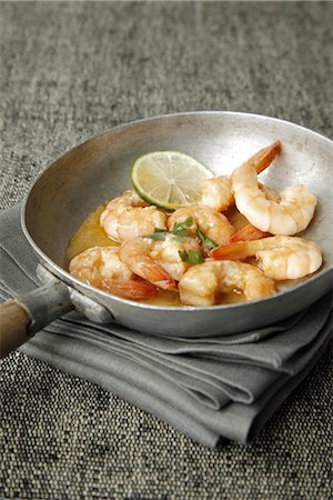 simsearch:652-05809573,k - Gambas sauté with lime Foto de stock - Sin royalties Premium, Código: 652-03801830