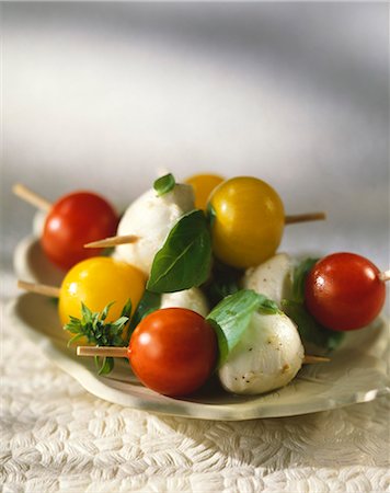 Cherry tomato and mozzarella brochettes Stock Photo - Premium Royalty-Free, Code: 652-03802056