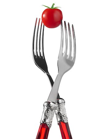 simsearch:652-03802230,k - Two forks with cherry tomato Fotografie stock - Premium Royalty-Free, Codice: 652-03802228