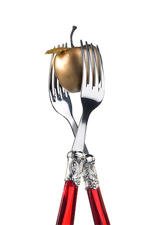dúo - Two forks with golden candle Foto de stock - Sin royalties Premium, Código: 652-03802235