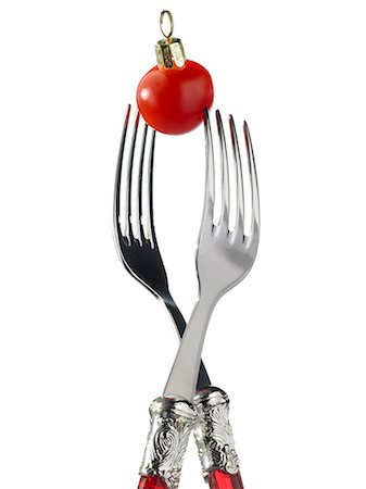 two forks with red Christmas decoration Stock Photo - Premium Royalty-Free, Code: 652-03802238