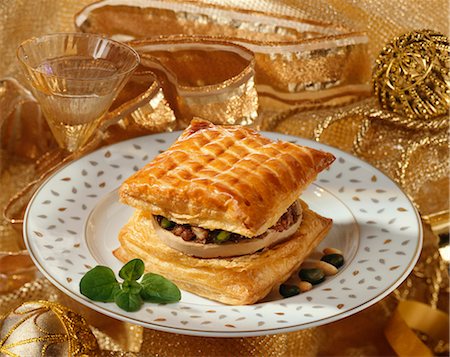 ribbon gold - Puff pastry filled with foie gras and dried fruit Stock Photo - Premium Royalty-Free, Code: 652-03802324