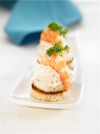 simsearch:652-03802601,k - Tuna mousse and shrimp on a bite-size slice of bread Stock Photo - Premium Royalty-Free, Code: 652-03802583