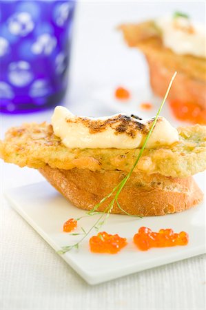 egg aperitif - Egg,cod and Aïoli  on a bite-size slice of bread Stock Photo - Premium Royalty-Free, Code: 652-03802619