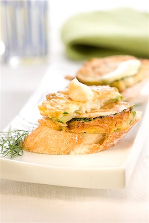 simsearch:652-03633514,k - Cod,Aïoli and zucchinis on a bite-size slice of bread Stock Photo - Premium Royalty-Free, Code: 652-03802637