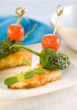 Breaded chicken,green pepper and cherry tomato skewers Stock Photo - Premium Royalty-Free, Code: 652-03802686