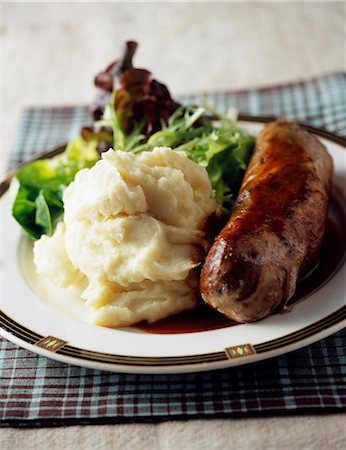 simsearch:652-03800630,k - Oven baked Andouillette with mashed potatoes Stock Photo - Premium Royalty-Free, Code: 652-03803041