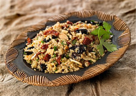 quinoa vegetable - Quinoa with olives and dried tomatoes Stock Photo - Premium Royalty-Free, Code: 652-03803176