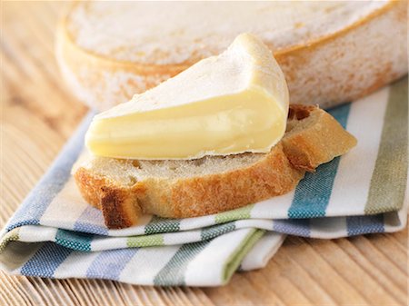 simsearch:652-03801126,k - A piece of Reblochon on a slice of bread Stock Photo - Premium Royalty-Free, Code: 652-03803190