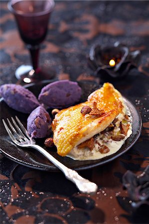 simsearch:632-05604290,k - Poulard hen's breast with creamy mushrooms and mashed purple potato quenelles Stock Photo - Premium Royalty-Free, Code: 652-03803246