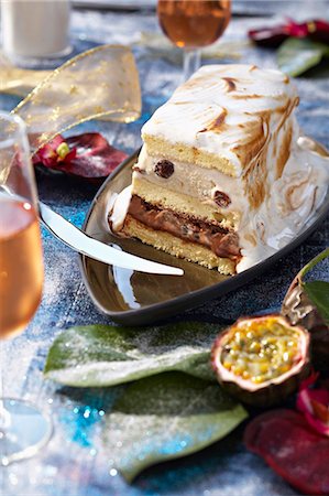 expensive cake images - Rum and passionfruit log cake flambée Stock Photo - Premium Royalty-Free, Code: 652-03803261