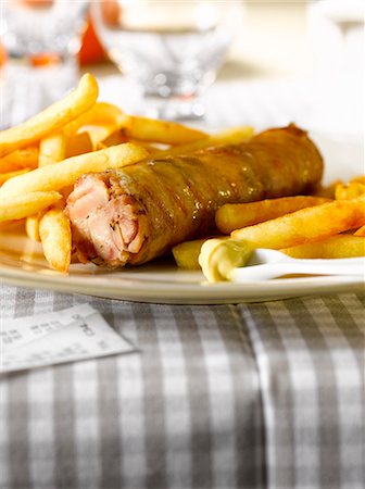 fried sausage - Andouillette with french fries Stock Photo - Premium Royalty-Free, Code: 652-03803339