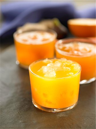 Carrot,orange and fig juice Stock Photo - Premium Royalty-Free, Code: 652-03803542