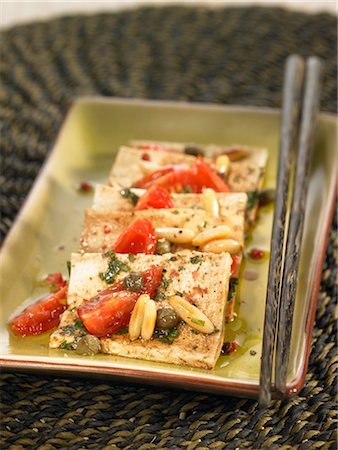 simsearch:652-03803518,k - Tofu with basil,tomatoes,capers and pine nuts Stock Photo - Premium Royalty-Free, Code: 652-03803593