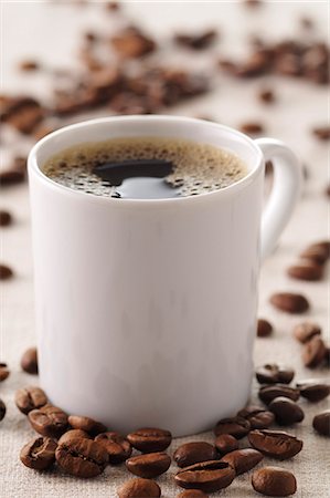 simsearch:652-05808282,k - Cup of coffee Foto de stock - Sin royalties Premium, Código: 652-03803739