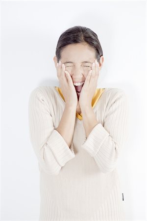 Young woman shouting Stock Photo - Premium Royalty-Free, Code: 669-05854533