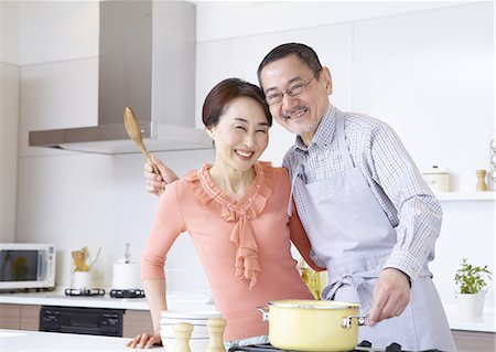east asian cooking - Senior couple enjoying cooking Stock Photo - Premium Royalty-Free, Code: 669-06023102