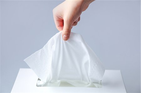A hand seizing tissue Stockbilder - Premium RF Lizenzfrei, Bildnummer: 669-08914797