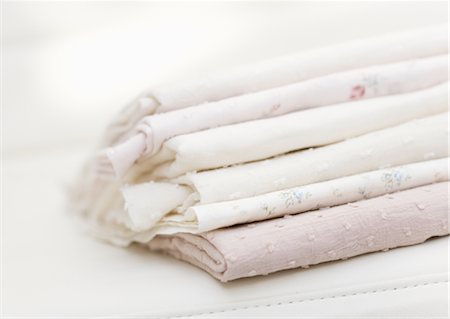 stacking - Pile of cloths Stock Photo - Premium Royalty-Free, Code: 670-04249299