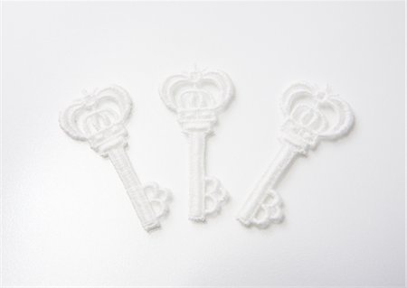 simsearch:670-06450359,k - Dentelle en forme de clé Photographie de stock - Premium Libres de Droits, Code: 670-05652605