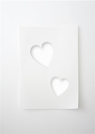 Papier découpé à la forme de coeur Photographie de stock - Premium Libres de Droits, Code: 670-05652648