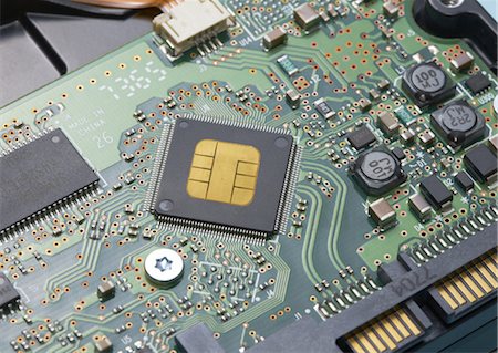 Electronic circuit with IC chip Stock Photo - Premium Royalty-Free, Code: 670-05854841
