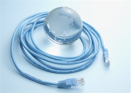 system - Glass globe surrounded with LAN cable Stock Photo - Premium Royalty-Free, Code: 670-05854851