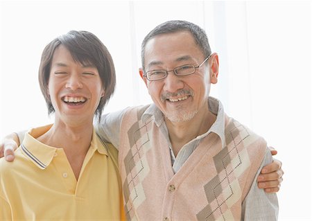 Smiling middle-aged man and senior man Stock Photo - Premium Royalty-Free, Code: 670-06024832