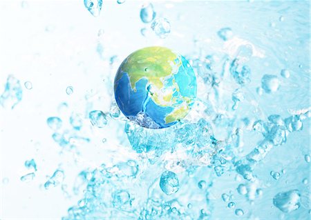 planet - Globe and splashes of water Stock Photo - Premium Royalty-Free, Code: 670-06449990
