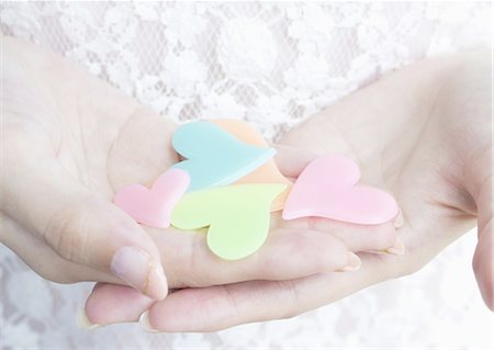 simsearch:670-06450401,k - Hand holding hearts Stock Photo - Premium Royalty-Free, Code: 670-06450315
