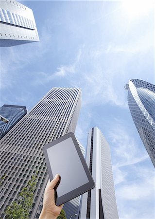 Office buildings and a tablet PC Stock Photo - Premium Royalty-Free, Code: 670-06450410