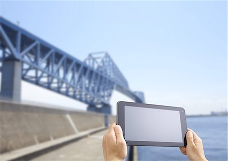 Tokyo Gate Bridge and a tablet PC Stock Photo - Premium Royalty-Free, Code: 670-06450458