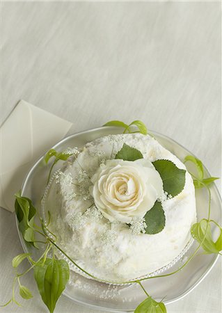 envelope (package) - White rose cake Stock Photo - Premium Royalty-Free, Code: 670-06450821
