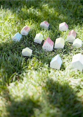 ecology - Miniature houses on lawn Stock Photo - Premium Royalty-Free, Code: 670-06450838
