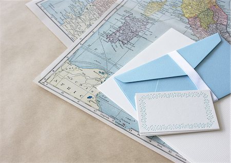 Letter stationery and maps Stock Photo - Premium Royalty-Free, Code: 670-06450904