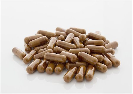 Capsules brunes Photographie de stock - Premium Libres de Droits, Code: 670-06451150