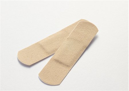 Adhesive bandages Foto de stock - Sin royalties Premium, Código: 670-06451185
