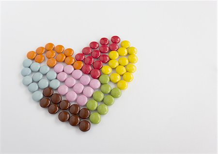 simsearch:670-06451334,k - Heart-shaped chocolate marbles Stock Photo - Premium Royalty-Free, Code: 670-06451350