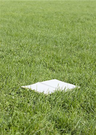 ecology - Notebook on a lawn Stock Photo - Premium Royalty-Free, Code: 670-06451411
