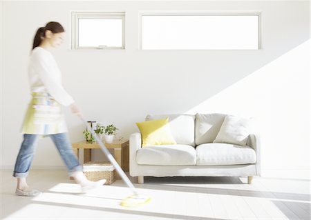 floor cleaning - Woman mopping Stock Photo - Premium Royalty-Free, Code: 670-03484360