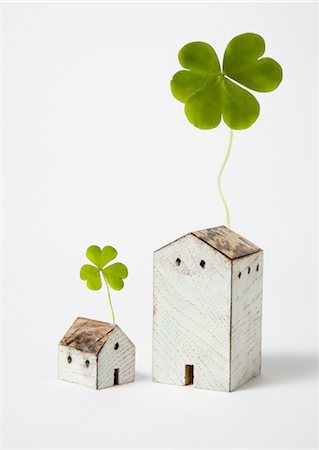ecology - Clovers and miniature houses Stock Photo - Premium Royalty-Free, Code: 670-03607562