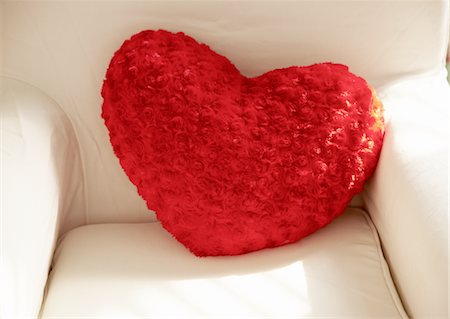 Heart shaped cushion Stock Photo - Premium Royalty-Free, Code: 670-03709953