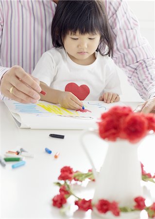 Father and daughter drawing Stock Photo - Premium Royalty-Free, Code: 670-03709981