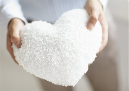 Heart shaped cushion Stock Photo - Premium Royalty-Free, Code: 670-03709983